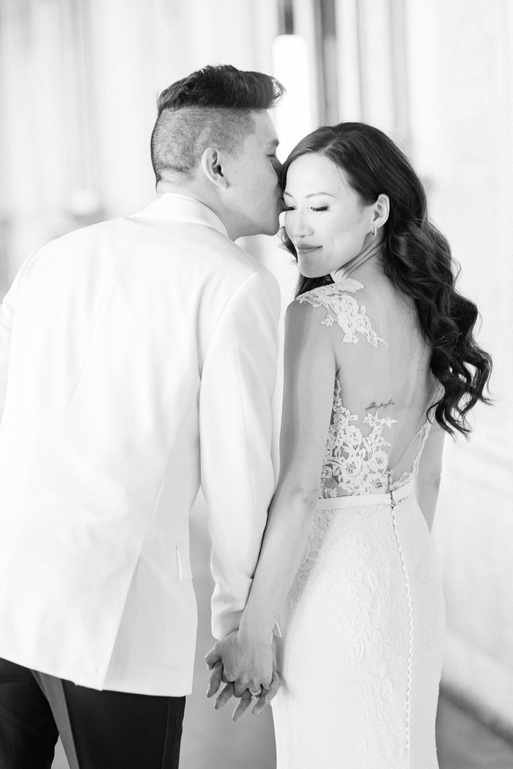 Black and white portrait of bride and groom captured by Koman Photography at Villa Corsini in Tuscany, timeless and elegant.