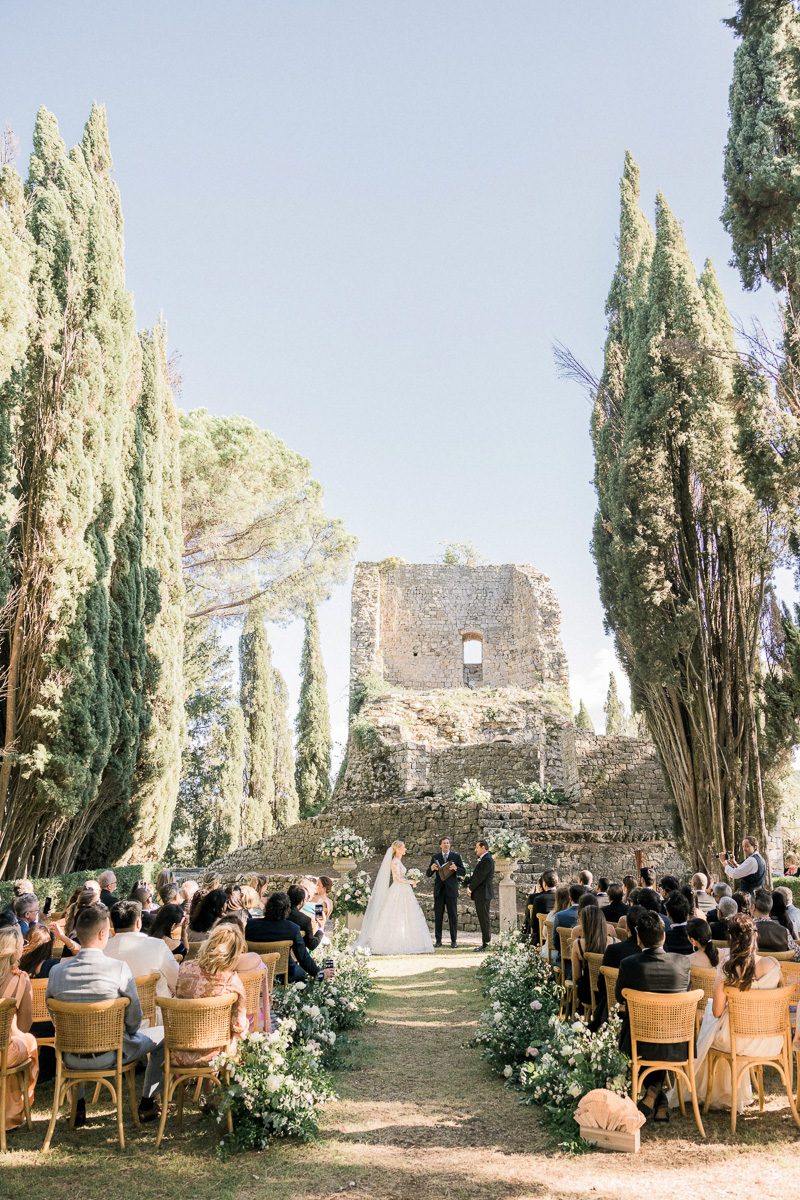Wedding ceremony at Castiglion del Bosco in Tuscany overlooking the Chianti hills